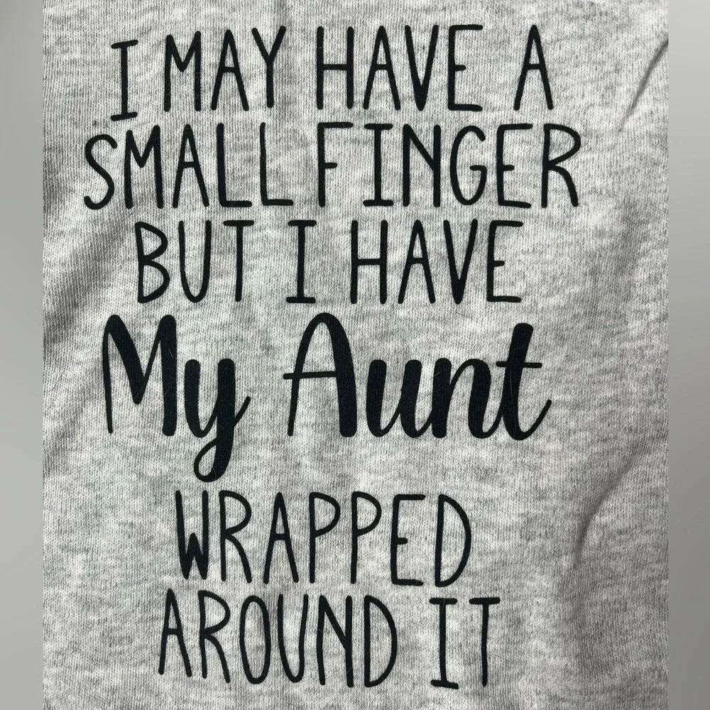 Baby Onesie “I May Have a Small Finger But I Have My Aunt Wrapped Around It”